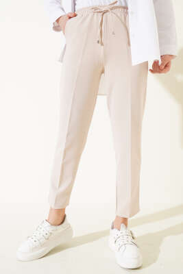 Beli Lastikli Dar Paça Pantolon Bej - Pantolon