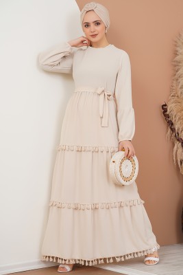 Katları Püskül Detaylı Bej Elbise